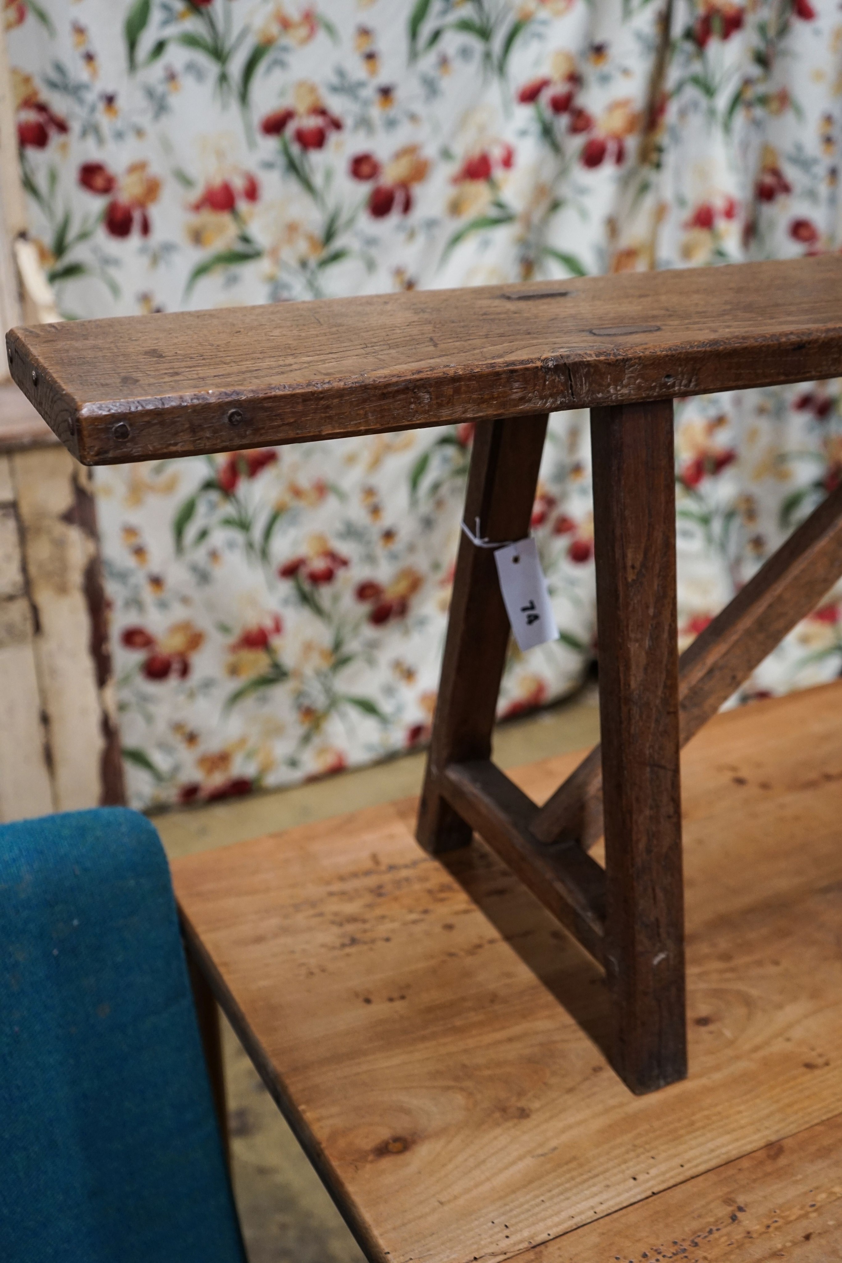 A 19th century French provincial oak bench seat, length 194cm, depth 30cm, height 42cm